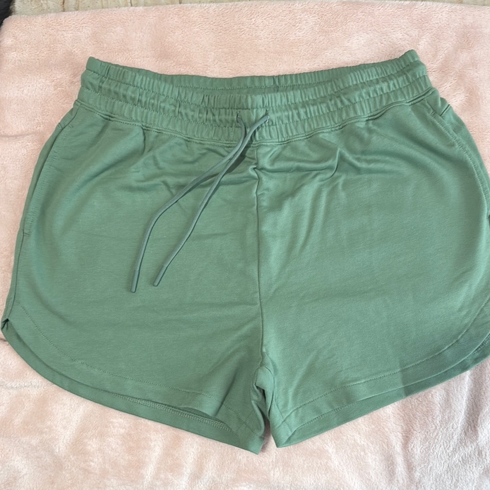 Gymshark Green Athletic Shorts with Soft Fabric and Drawstring